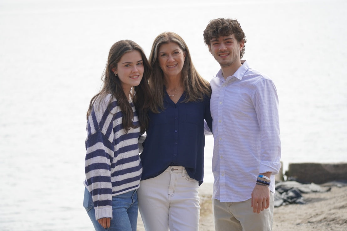 Mom with her teens on beach